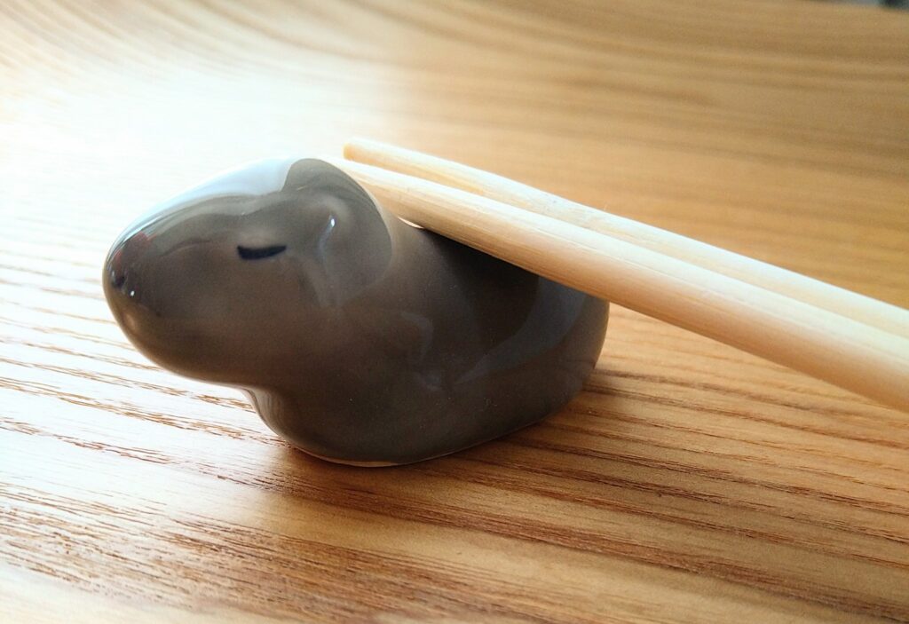 capybara chopstick rest relaxing